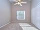 Well-lit bedroom with carpet and double door closet at 2529 Clareside Dr, Valrico, FL 33596