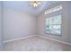 Bright bedroom with carpeted floor, ceiling fan, and large window at 2529 Clareside Dr, Valrico, FL 33596