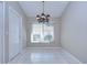 Bright dining room with chandelier and tile flooring at 2529 Clareside Dr, Valrico, FL 33596