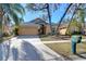 House exterior with driveway, landscaping, and mailbox at 2529 Clareside Dr, Valrico, FL 33596