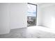 Bedroom with city view and marble-look tile floor at 777 3Rd N Ave # 1605, St Petersburg, FL 33701