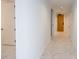 Bright hallway with marble-look tile floors and modern doors at 777 3Rd N Ave # 1605, St Petersburg, FL 33701