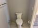 Clean bathroom with toilet and tiled floor at 208 Nina Way # 208, Oldsmar, FL 34677