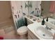 Bathroom with shower/tub combo and updated vanity at 208 Nina Way # 208, Oldsmar, FL 34677