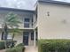 Well-maintained building exterior with landscaping at 208 Nina Way # 208, Oldsmar, FL 34677