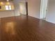 Spacious living room with wood-look floors at 208 Nina Way # 208, Oldsmar, FL 34677