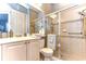 Bathroom with shower, toilet, and single vanity at 20953 Broadwater Dr, Land O Lakes, FL 34638