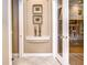 Elegant hallway with decorative wall accents and tiled floors at 20953 Broadwater Dr, Land O Lakes, FL 34638