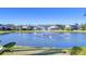 Community lake with fountain, providing a serene backdrop to the homes at 20953 Broadwater Dr, Land O Lakes, FL 34638
