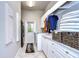 Laundry room with washer, dryer, and storage at 20953 Broadwater Dr, Land O Lakes, FL 34638