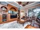 Spacious living room with leather sectional sofa and built-in entertainment center at 20953 Broadwater Dr, Land O Lakes, FL 34638