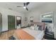 Spacious bedroom with ensuite bathroom and large windows at 4008 W Leila Ave, Tampa, FL 33616