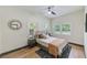Bright bedroom with a comfortable bed and plenty of natural light at 4008 W Leila Ave, Tampa, FL 33616