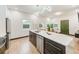 Modern kitchen with marble island and stainless steel appliances at 4008 W Leila Ave, Tampa, FL 33616