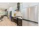Modern kitchen with stainless steel appliances and wine cooler at 4008 W Leila Ave, Tampa, FL 33616