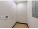 Bright laundry room with washer and dryer hookups, and neutral-colored walls at 4008 W Leila Ave, Tampa, FL 33616