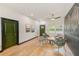Bright living room with hardwood floors and seating area at 4008 W Leila Ave, Tampa, FL 33616