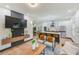 Open living room showcasing modern furniture and a stylish TV wall unit at 4008 W Leila Ave, Tampa, FL 33616