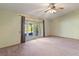 Main bedroom with sliding glass doors and pool view at 7853 Sundown Dr, St Petersburg, FL 33709