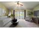 Furnished main bedroom with sliding doors leading to the backyard at 7853 Sundown Dr, St Petersburg, FL 33709