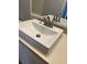 Modern bathroom sink with brushed nickel faucet and neutral countertop at 10024 Strafford Oak Ct # 815, Tampa, FL 33624