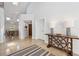 Bright and spacious entryway with tile floors and stylish decor at 123 8Th E St, Tierra Verde, FL 33715