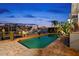Inviting pool and patio area with brick pavers, offering waterfront views at 123 8Th E St, Tierra Verde, FL 33715