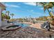 Enjoy a refreshing dip in the pool and spa with a canal view at 123 8Th E St, Tierra Verde, FL 33715