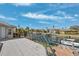 Spacious waterfront deck with water views and a metal railing at 123 8Th E St, Tierra Verde, FL 33715