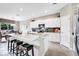 Spacious kitchen with white cabinets, granite counters, and island at 15304 Serengeti Blvd, Spring Hill, FL 34610