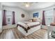 Bright bedroom with a comfortable bed and plenty of natural light at 3836 Chris Dr, Wesley Chapel, FL 33543