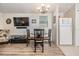 Small dining area with a round table and four chairs at 3836 Chris Dr, Wesley Chapel, FL 33543