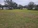 Open land with distant home at 6658 Williams Rd, Seffner, FL 33584