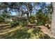 Ranch style home with mature landscaping and walkway at 7250 128Th St, Seminole, FL 33776