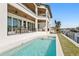 Home exterior featuring a luxurious pool and beautiful waterfront access at 1940 Hawaii Ne Ave, St Petersburg, FL 33703