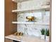 Elegant marble countertop bar area with plants and stylish décor at 1940 Hawaii Ne Ave, St Petersburg, FL 33703