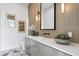 Modern bathroom with tiled wall accents, double sinks, and elegant decor at 1940 Hawaii Ne Ave, St Petersburg, FL 33703