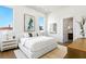 Bright bedroom with modern decor, hardwood floors, and a serene atmosphere at 1940 Hawaii Ne Ave, St Petersburg, FL 33703