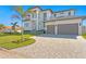 Contemporary two-story home with a large, three car attached garage at 1940 Hawaii Ne Ave, St Petersburg, FL 33703