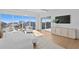 Bright main bedroom boasts large windows offering scenic views and a comfortable seating area at 1940 Hawaii Ne Ave, St Petersburg, FL 33703