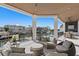 Outdoor patio with comfortable seating, ceiling fans, and waterfront views at 1940 Hawaii Ne Ave, St Petersburg, FL 33703