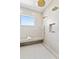 Modern shower with elegant rain shower and a built-in bench create a luxurious showering experience at 1940 Hawaii Ne Ave, St Petersburg, FL 33703
