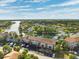 Aerial view of waterfront community with lush landscaping and boat access at 6321 Newtown Cir # 21B4, Tampa, FL 33615