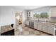 Bright kitchen featuring granite countertops and stainless steel appliances at 6321 Newtown Cir # 21B4, Tampa, FL 33615