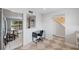 Kitchen with desk area, tile floors, and view into dining area at 6321 Newtown Cir # 21B4, Tampa, FL 33615