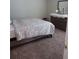 Bedroom with a dresser and patterned bedding at 10319 Boyette Creek Blvd, Riverview, FL 33569