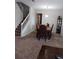 Formal dining room with dark wood furniture and carpeting at 10319 Boyette Creek Blvd, Riverview, FL 33569