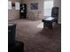 Spacious game room with carpet flooring and arcade game at 10319 Boyette Creek Blvd, Riverview, FL 33569