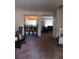 Home bar with seating for four and a view into the living room at 10319 Boyette Creek Blvd, Riverview, FL 33569