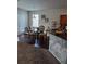 Kitchen with breakfast nook, granite counters and dark wood cabinets at 10319 Boyette Creek Blvd, Riverview, FL 33569
